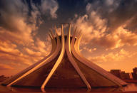 <p>Brasilia was built from scratch beginning in 1956, and is now a landmark of urban planning. Designed architect Oscar Niemeyer and planner Lucio Costa, Brazil’s capital city is full of inventive design, like that of the Catedral Metropolitana, shown here. It is the only city built in the 20th century to be designated a heritage site, and it’s definitely worth taking an architectural tour. World Heritage site since 1987. (Photo: Paulo Fridman/Corbis via Getty Images) </p>