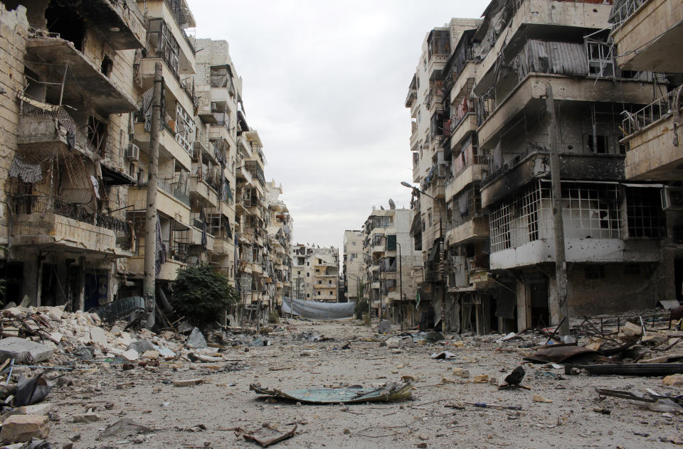 A picture taken on December 1, 2013, shows damaged buildings in the Salah al-Din neighbourhood of the northern Syrian city of Aleppo. (MOHAMMED AL-KHATIEB/AFP/Getty Images)