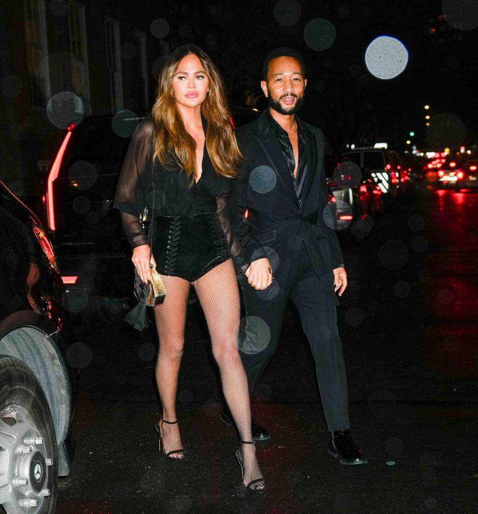 Chrissy Teigen and John Legend visit Polo Bar in New York City.