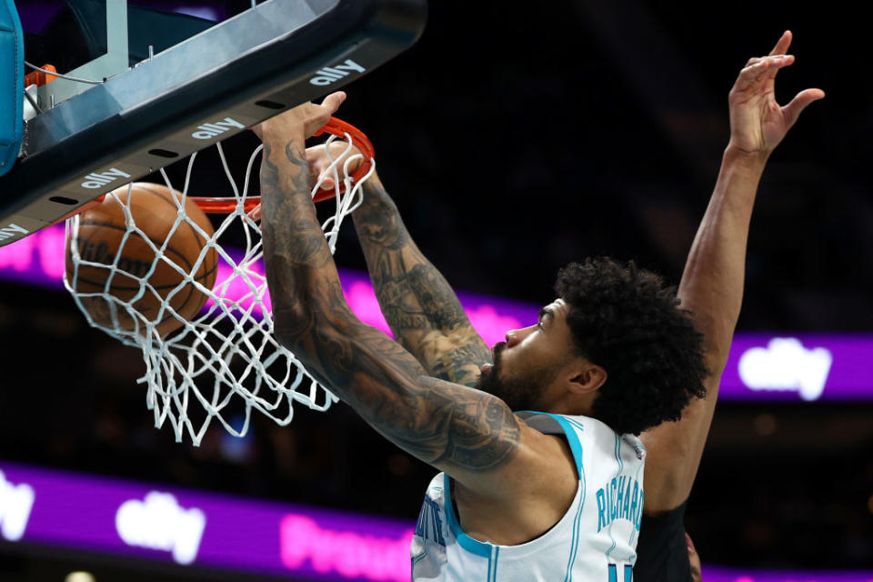 CHARLOTTE, NORTH CAROLINA - FEBRUARY 07: Nick Richards #4 of the Charlotte Hornets dunks the ball during the second half of the game against the Toronto Raptors at Spectrum Center on February 07, 2024 in Charlotte, North Carolina. NOTE TO USER: User expressly acknowledges and agrees that, by downloading and or using this photograph, User is consenting to the terms and conditions of the Getty Images License Agreement. (Photo by Jared C. Tilton/Getty Images)