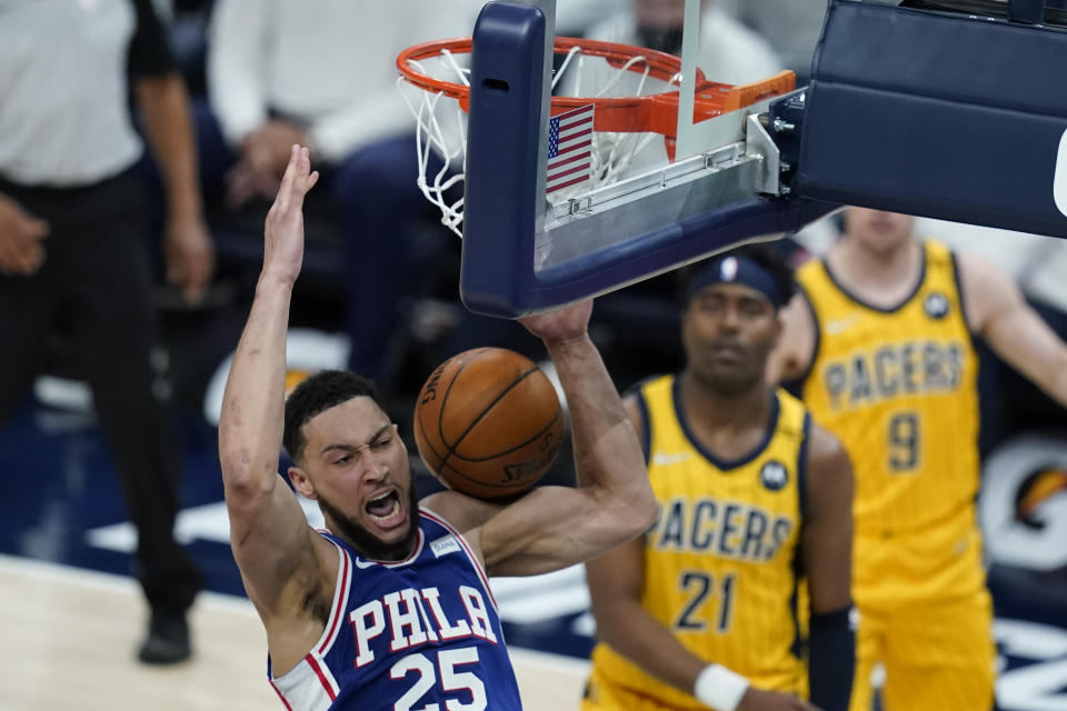 Philadelphia 76ers' Ben Simmons (25) dunks during the first half of an NBA basketball game against the Indiana Pacers, Tuesday, May 11, 2021, in Indianapolis. (AP Photo/Darron Cummings)