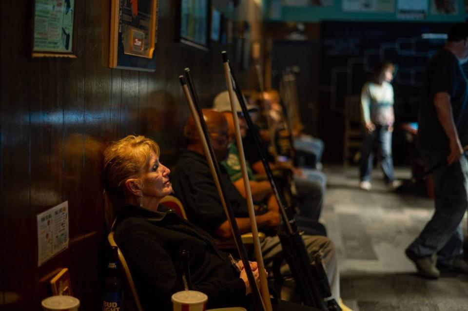 Jinny Hilderbrand watches from the sidelines as she waits her turn to play Thursday night. Jose Luis Villegas/jvillegas@sacbee.com