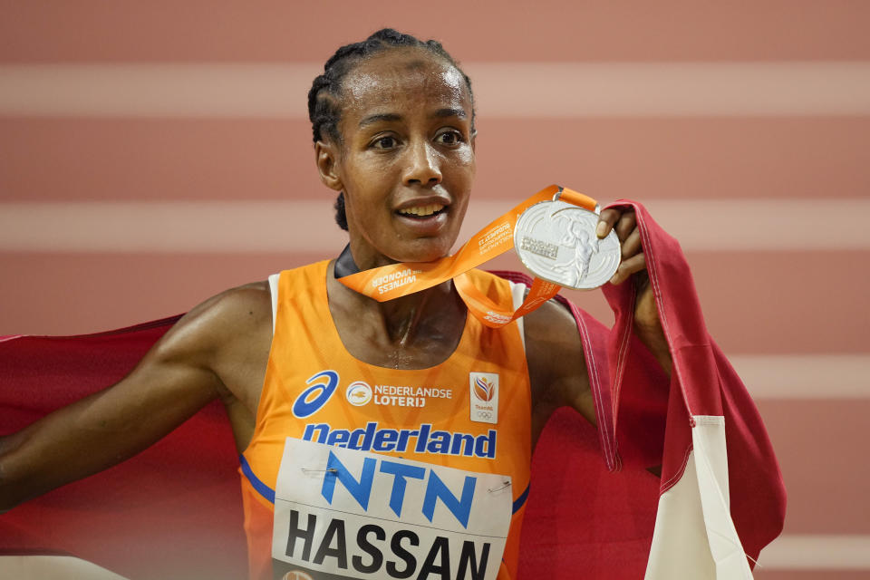 Sifan Hassan, of the Netherlands, celebrates her silver medal finish in the Women's 5000-meters final during the World Athletics Championships in Budapest, Hungary, Saturday, Aug. 26, 2023. (AP Photo/Martin Meissner)