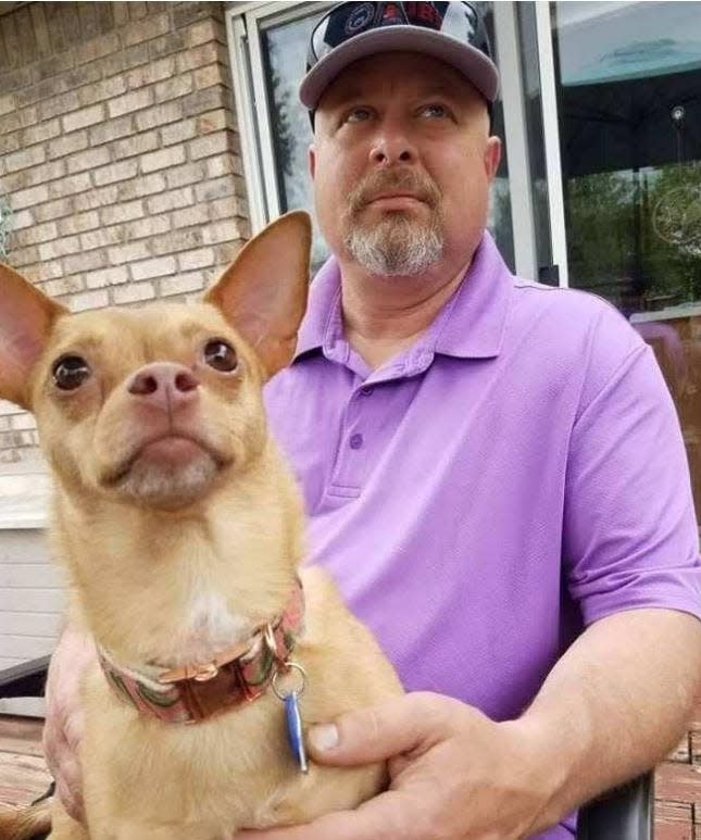 This undated photo of Delphi murder suspect Richard Allen shows how he appeared before his arrest. Allen is holding a dog, and he appears to be healthy, according to his attorney's motion filed April 5, 2023.