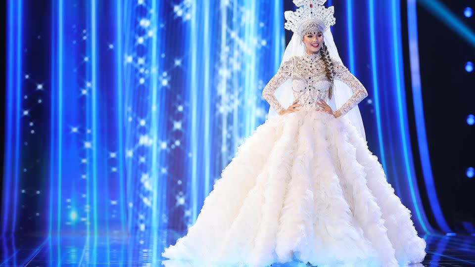 A borderline bridal moment from Miss Russia, who wore an intricately beaded white gown, veil and crown. - Hector Vivas/Getty Images