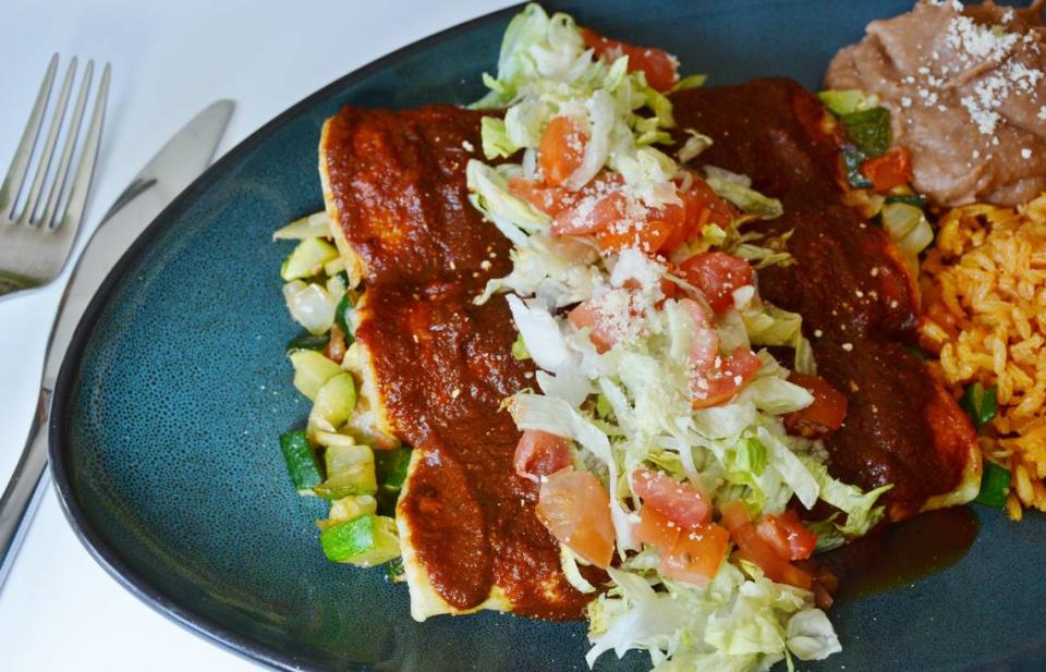 At Three Amigos, order the Enchiladas Calabaza, made with zucchini, covered in your choice of roja, verde or mole sauce and then topped with lettuce, tomato, onions, avocado and queso fresco. It’s served with rice and beans.