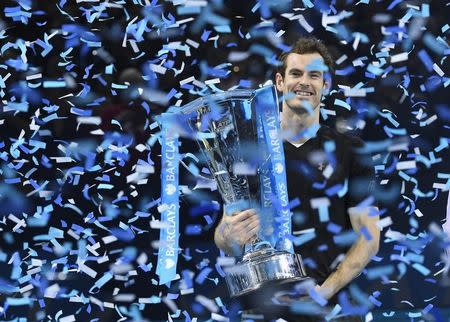 Tennis Britain - Barclays ATP World Tour Finals - O2 Arena, London - 20/11/16 Great Britain's Andy Murray celebrates winning the final against Serbia's Novak Djokovic with the ATP World Tour Finals trophy Reuters / Toby Melville Livepic