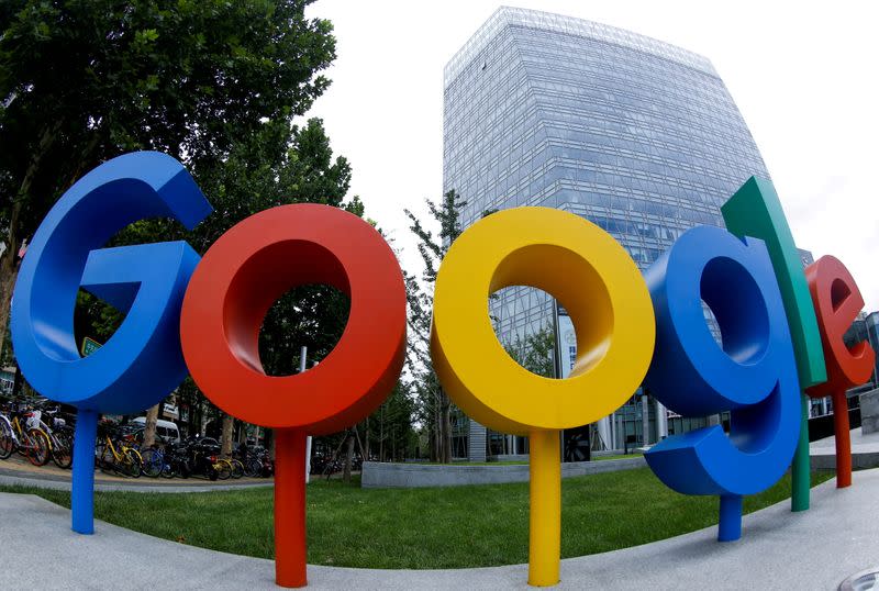 FILE PHOTO: FILE PHOTO: The brand logo of Alphabet Inc's Google is seen outside its office in Beijing