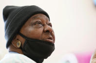 P.M. Browner, 88, speaks about her apprehension over receiving the COVID-19 vaccine, while waiting for a transportation bus at the Rev. S.L.A. Jones Activity Center for the Elderly to take her to receive a vaccination, Wednesday, April 7, 2021, in Clarksdale, Miss. She said she thinks vaccinations will eventually be required, and she wants to be able to continue to socialize at a local senior center. (AP Photo/Rogelio V. Solis)