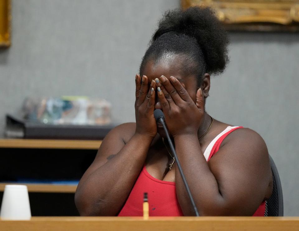 Tavon Jefferson cries as she testifies at the murder trial of Austin police officer Christopher Taylor at the Blackwell-Thurman Criminal Justice Center on Monday. Taylor is charged in the killing of Michael Ramos in 2020.