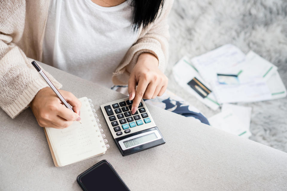 woman using a calculator