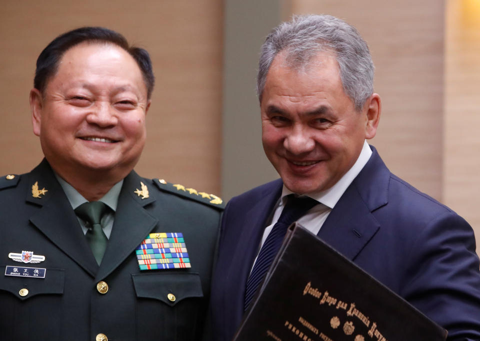 Russian Defence Minister Sergei Shoigu meets with China's Central Military Commission Vice Chairman Zhang Youxia at the Novo-Ogaryovo state residence outside Moscow, Russia December 7, 2017. REUTERS/Sergei Karpukhin