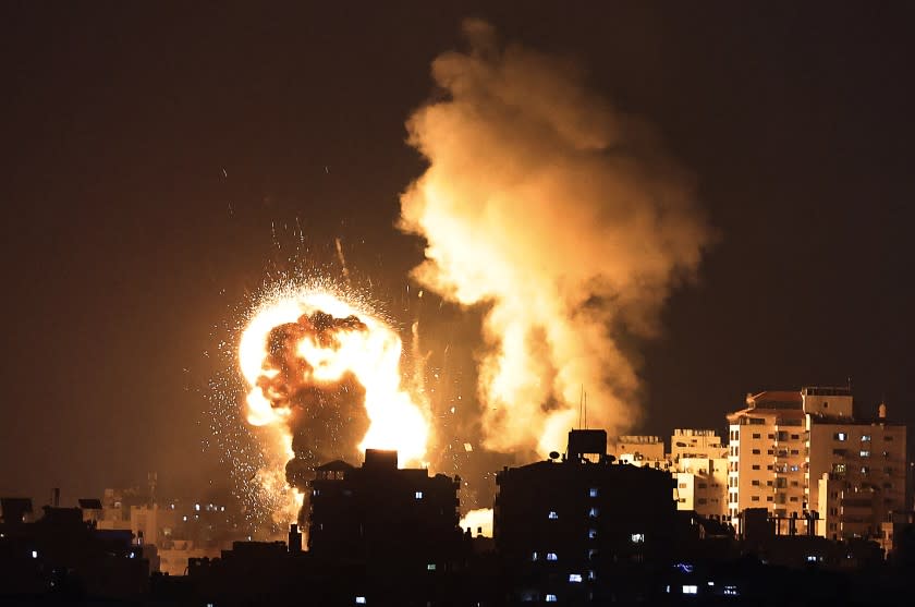 TOPSHOT - A picture shows Israeli air strikes in the Gaza Strip, controlled by the Palestinian Islamist movement Hamas, on May 10, 2021. - Israel launched deadly air strikes on Gaza in response to a barrage of rockets fired by the Islamist movement Hamas amid spiralling violence sparked by unrest at Jerusalem's Al-Aqsa Mosque compound. (Photo by MAHMUD HAMS / AFP) (Photo by MAHMUD HAMS/AFP via Getty Images)