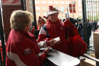 ST LOUIS, MO - OCTOBER 19: Fans enter the stadium prior to Game One of the MLB World Series between the Texas Rangers and the St. Louis Cardinals at Busch Stadium on October 19, 2011 in St Louis, Missouri. (Photo by Ezra Shaw/Getty Images)