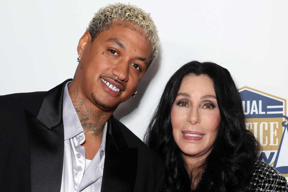 <p>CraSH/Shutterstock</p> Alexander Edwards and Cher at the Equal Justice Now Awards in Los Angeles on March 29, 2024