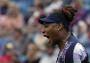 Serena Williams of the United States celebrates after scoring a point during their doubles tennis match with Ons Jabeur of Tunisia against Marie Bouzkova of Czech Republic and Sara Sorribes Tormo of Spain at the Eastbourne International tennis tournament in Eastbourne, England, Tuesday, June 21, 2022. (AP Photo/Kirsty Wigglesworth)