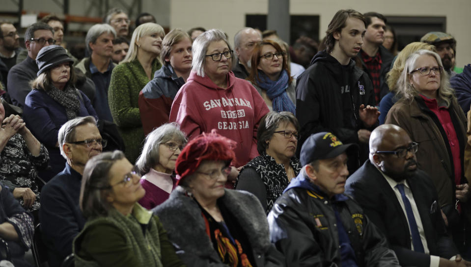 Supporters listen as Sen. Sherrod Brown, D-Ohio, speaks at a rally in Brunswick, Ohio before kicking off his multi-state tour of states that cast pivotal early votes in the 2020 presidential primary, Wednesday, Jan. 30, 2019. Brown began his "Dignity of Work" tour Wednesday in Brunswick, Ohio. The circuit is a key step before he decides whether to launch a campaign for the White House. (AP Photo/Tony Dejak)
