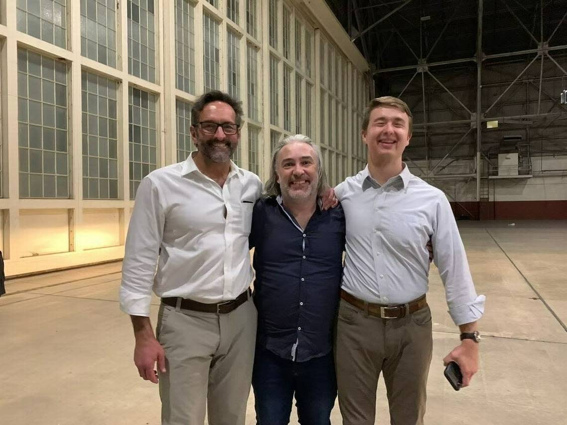 Matthew Heath, a former U.S. Marine, at a U.S. military hangar in Texas on Oct. 1 after being released by Venezuela that day in a prisoner swap with the United States. From left: Roger Carstens, U.S. special envoy for hostage affairs; Heath; Evan Berlanti, special assistant at the State Department.