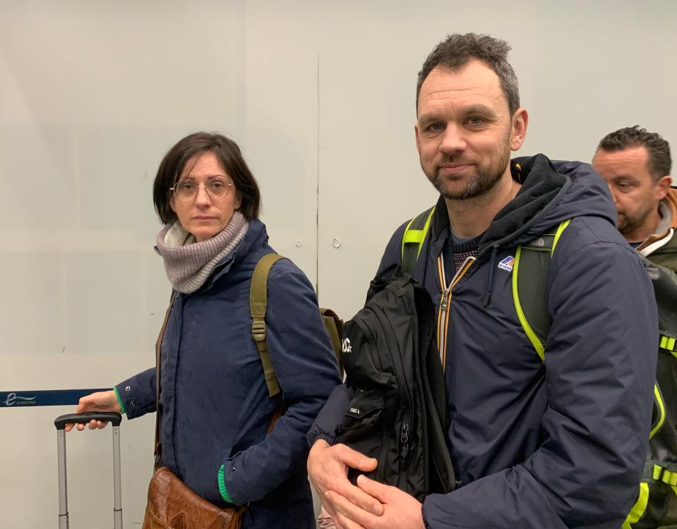 Maes Bert, 45 and her partner Lievens Nele, 45, from Brussels, who are hoping to get home to their daughter in time for New Year (Lucas Cumiskey/PA Wire)