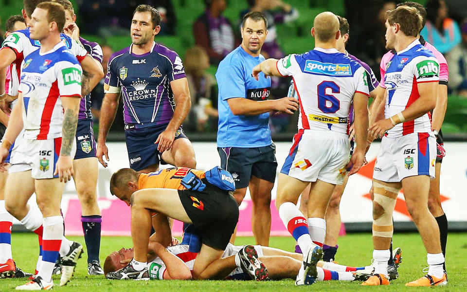 Alex McKinnon, pictured here after suffering spinal injuries in a match for Newcastle in 2014.