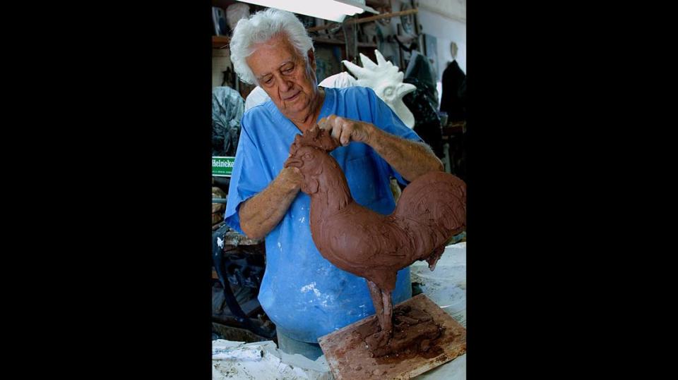 In this 2002 Miami Herald photo, Cuban sculptor Tony Lopez works on the first model for the “Rooster Walk” project in Little Havana.