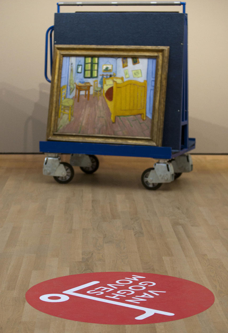 A Vincent van Gogh's painting "The Bedroom" sits on a felt-lined carrier trolley at the Van Gogh Museum in Amsterdam, Netherlands, Sunday, Sept. 23, 2012. While the museum closes for seven months for renovations, 75 works by the Dutch painter will be displayed instead across town at The Hermitage, an Amsterdam satellite of the Russian state museum. The tricky process of transporting the artworks under police escort began immediately after the last visitors left the museum Sunday evening and carried on through the night into Monday morning. The Van Gogh Museum reopens April 25, 2013. (AP Photo/Cris Toala Olivares)