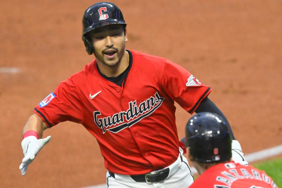 Sep 25, 2024; Cleveland, Ohio, USA; Cleveland Guardians left fielder Steven Kwan (38) celebrates his solo home run with designated hitter Kyle Manzardo (9) in the first inning against the Cincinnati Reds at Progressive Field. Mandatory Credit: David Richard-Imagn Images