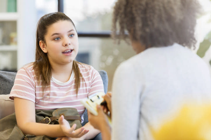 Teenager talking to a therapist