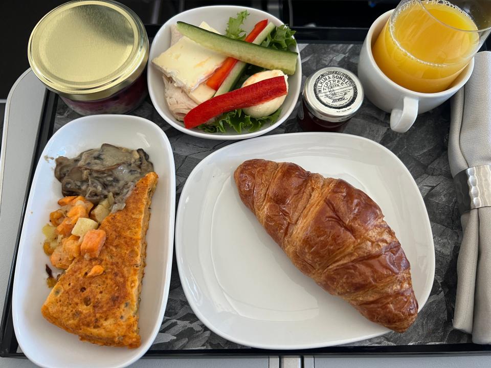 breakfast on icelandair - croissant, orange juice, veggies