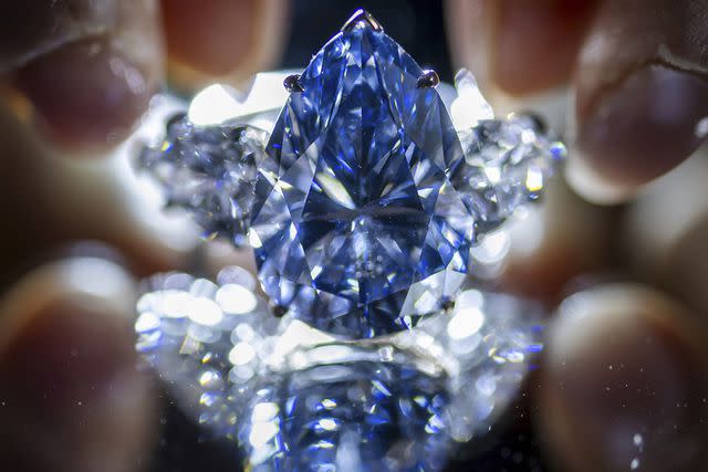 <p>Martial Trezzini/Keystone via AP</p> The rare diamond sold for almost $44 million at auction on Tuesday