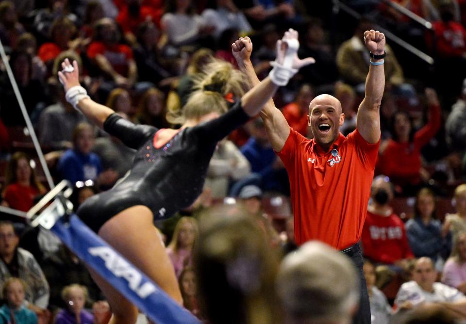 Utah assistant coach Jimmy Pratt celebrates as gymnast Cami Winger finishes her bars routine as BYU, Utah, SUU and Utah State meet in the Rio Tinto Best of Utah Gymnastics competition at the Maverick Center in West Valley City on Monday, Jan. 15, 2024. | Scott G Winterton, Deseret News