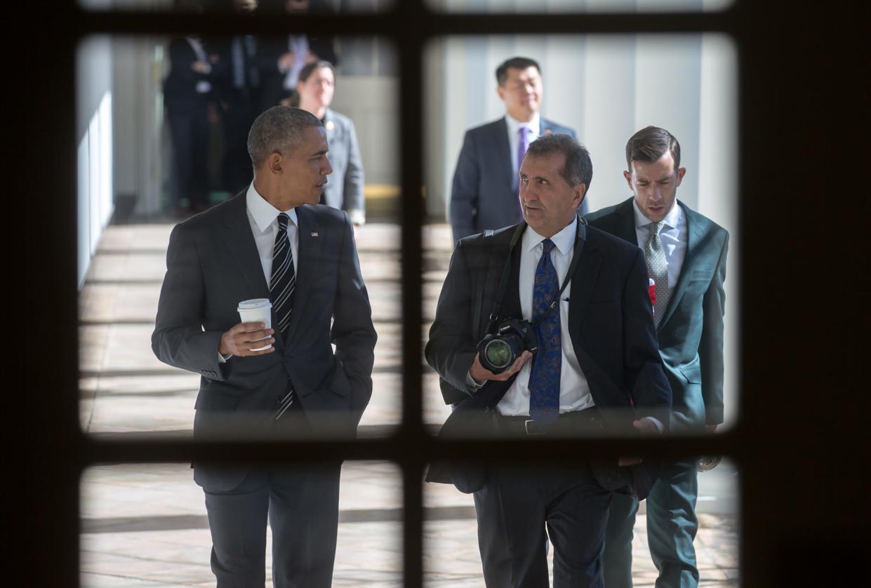 President Barack Obama walks along the West Colonnade of the White House with Chief White House Photographer Pete Souza  Feb. 18, 2016. Souza is the keynote speaker at the upcoming Warren G. Harding Symposium, scheduled for July 14-15 at the Harding Presidential Sites and The Ohio State University at Marion campus.