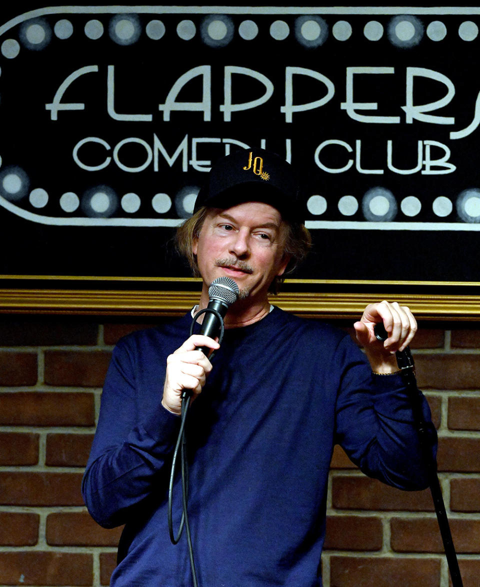 David Spade performs at Flappers Comedy Club and Restaurant on January 5, 2022, in Burbank, California. - Credit: Michael S. Schwartz/Getty Images