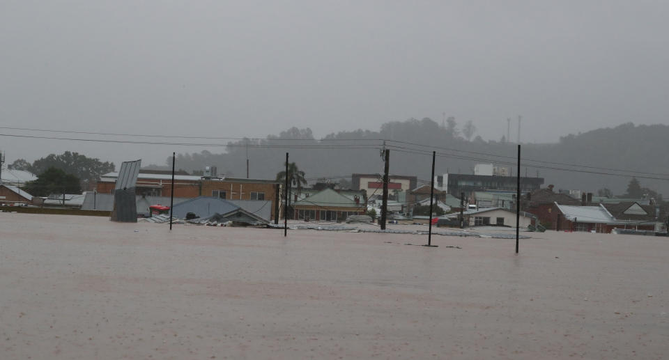 Flooding occurs in the town of Lismore, northeastern New South Wales, Monday, February 28, 2022. A severe weather warning is in place for southeast Queensland and areas in northern NSW as wild weather and dangerous flooding continues to severely impact large swathes of both states. (AAP Image/Jason O'Brien) NO ARCHIVING