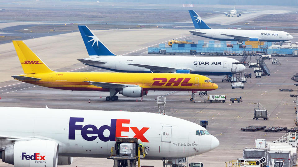 Boeing 767 freighters operated by FedEx Express and Star Airlines (now named Maersk Air Cargo) and a DHL 757 freighter are parked at the cargo terminal at Cologne Bonn Airport in Germany on March 2, 2018. The supply of older 757 and 767 passenger jets that can be transformed to carry main-deck cargo is running out. (Photo: Shutterstock/Tobias Arhelger)