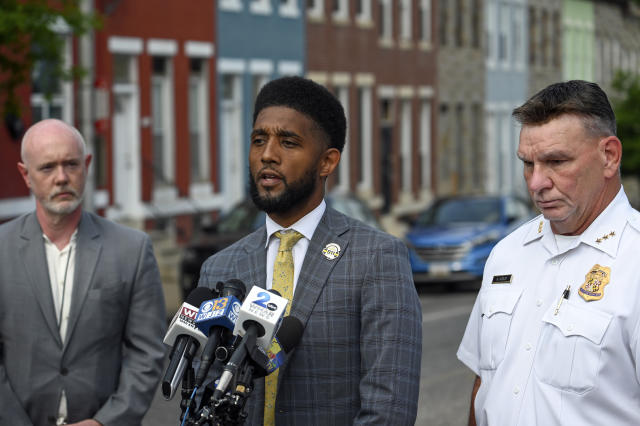 Baltimore Mayor Brandon Scott, center, speaks at a press conference after an officer involved shooting in the Shipley Hill neighborhood of Baltimore, Thursday afternoon, May 11, 2023. (Jerry Jackson/The Baltimore Sun via AP)