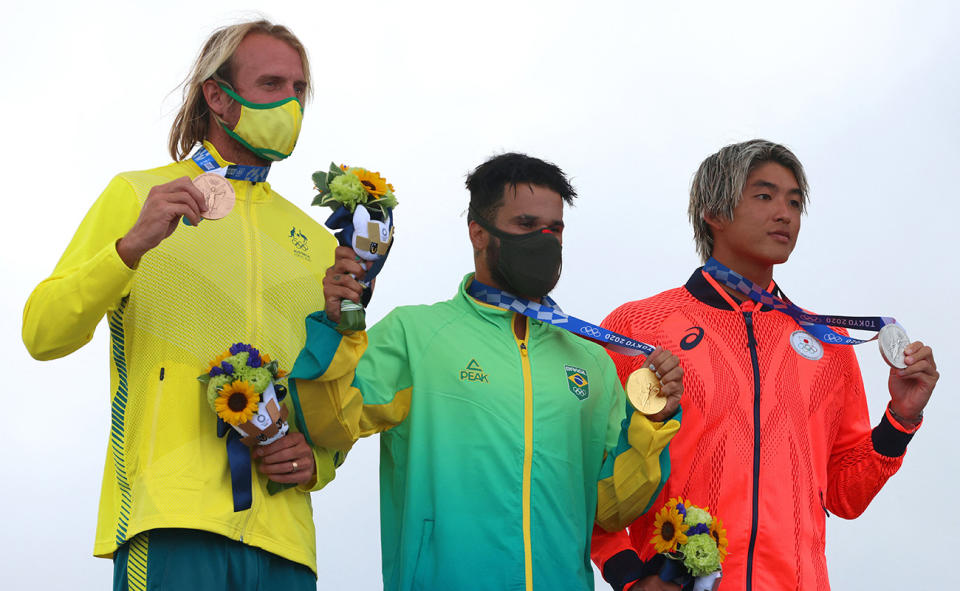 Owen Wright, pictured here with his bronze medal in surfing at the Tokyo Olympics in 2021.