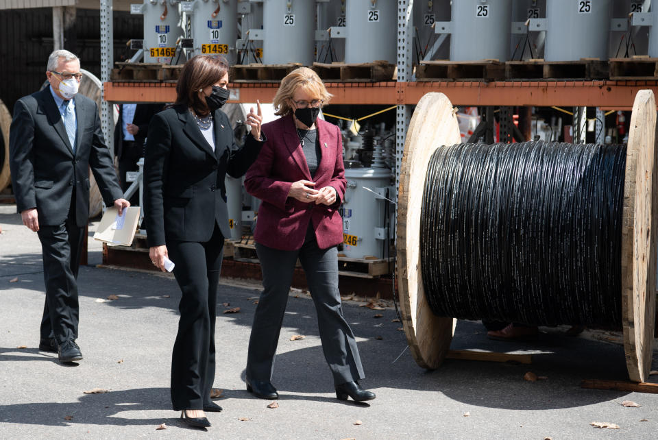 US Vice President Kamala Harris walks with US Senator Maggie Hassan (D-NH) (R) Democrat of New Hampshire, to a listening session on broadband internet at the New Hampshire Electric Co-op in Plymouth, New Hampshire, April 23, 2021, as she travels to the state to promote the administration's economic plans. (Photo by SAUL LOEB / AFP) (Photo by SAUL LOEB/AFP via Getty Images)