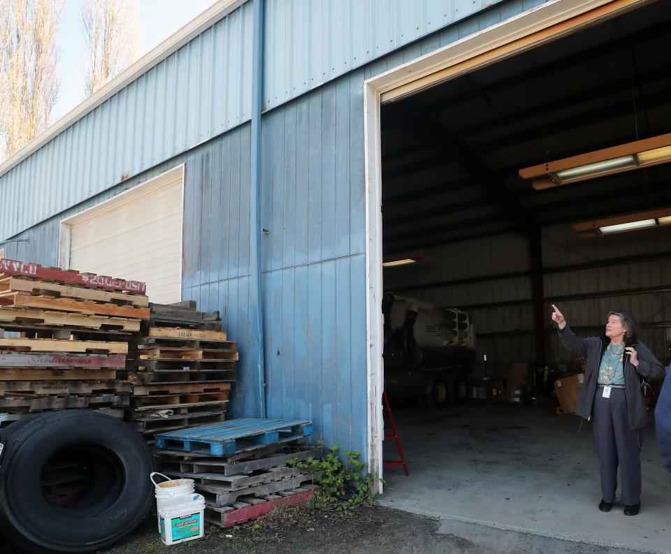 Mayor Becky Erickson talks about the different buildings located on the Poulsbo Public Works department parcel, while giving a tour of the property located on Iverson on Wednesday, April 10, 2024.