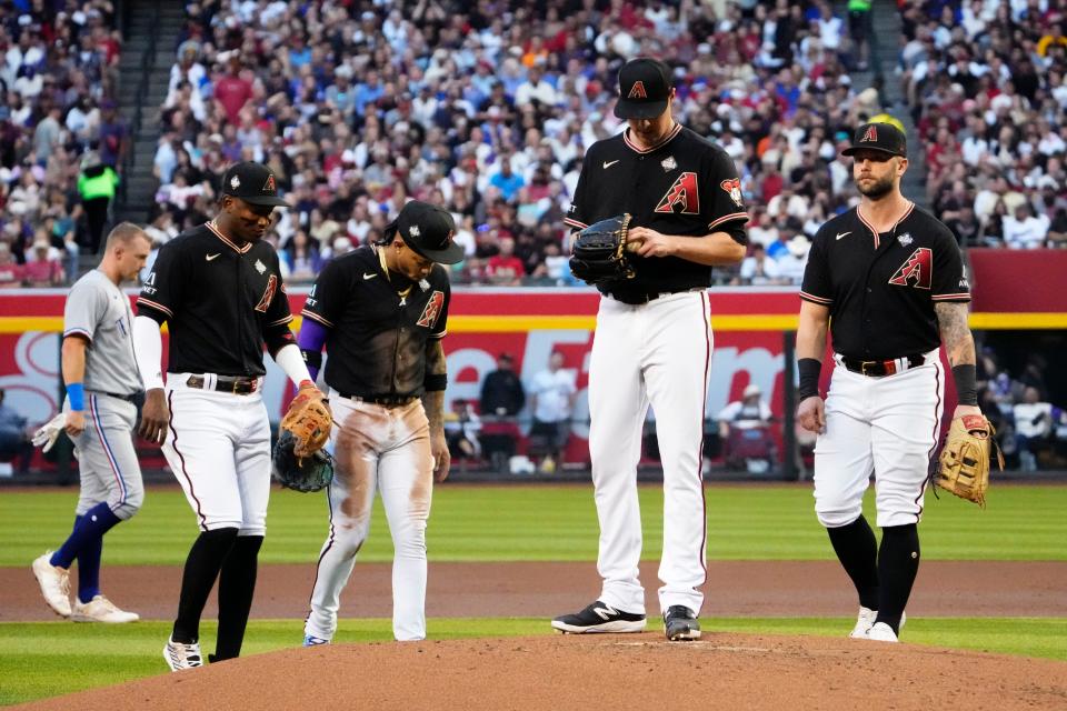 Arizona Diamondbacks starting pitcher Joe Mantiply (35) awaits on the mound during a pitching change against the Texas Rangers during the second inning in Game 4 of the 2023 World Series at Chase Field in Phoenix, AZ.