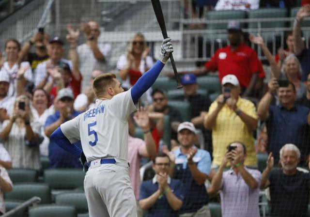 Emotional Freddie Freeman gets ring, ovations in return to Atlanta