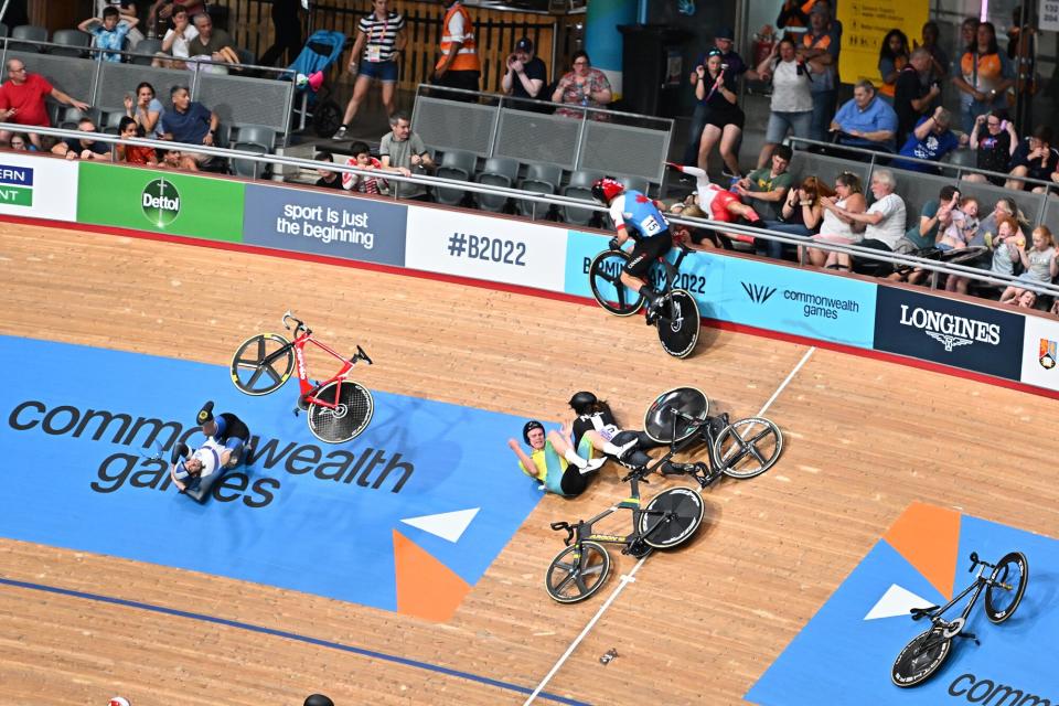 Crash England Matt Walls heads into the crowd in a crash Commonwealth Games, Track and Para Track Cycling. London, UK - 31 Jul 2022