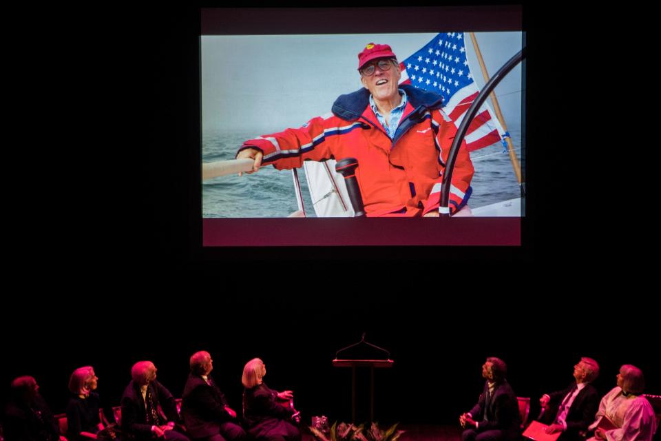 The family and friends of Pete du Pont watch a video tribute to the life of du Pont during a memorial service for the former Delaware Governor Friday, April 29, 2022, at The Playhouse on Rodney Square. 