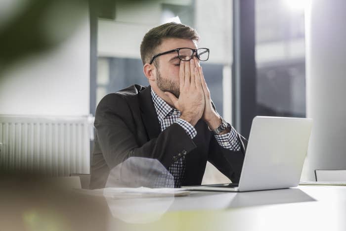 man frustrated in front of his computer