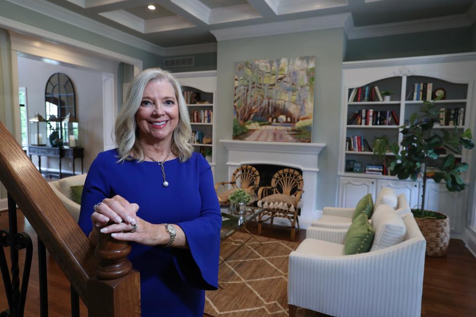 Susan Bunch in the sitting room inside her home in Elizabethtown, Ky. which features a painting by her on July 13, 2023.