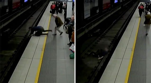 The man falls onto the tracks. Source: 7 News