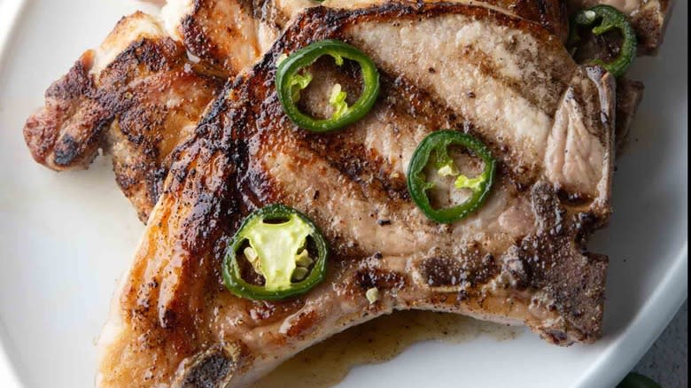 pork chops with sliced jalapeños