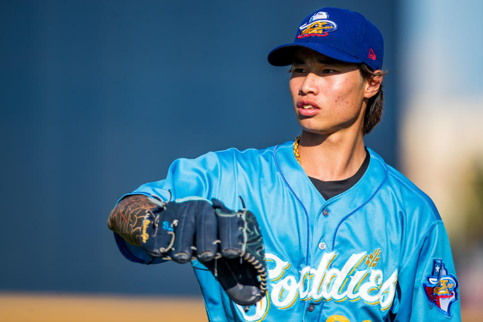 AMARILLO, TEXAS - JULY 22: Yu-Min Lin #20 of the Amarillo Sod Poodles warms up before the game against the Wichita Wind Surge at HODGETOWN Stadium on July 22, 2023 in Amarillo, Texas. (Photo by John E. Moore III/Getty Images)