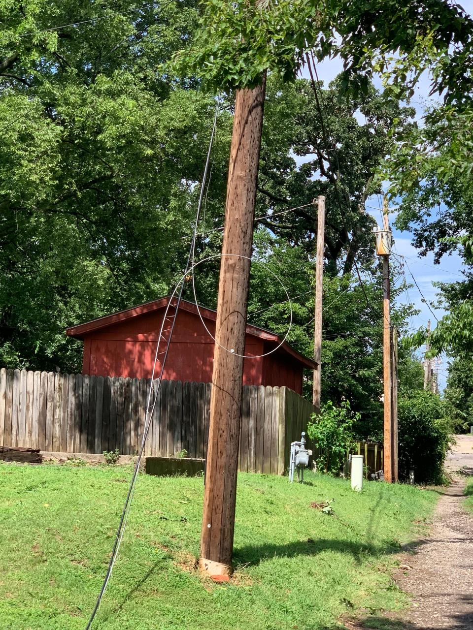 Power lines were blown down during overnight thunderstorms in Fort Smith at S 21 Street and Dodson Avenue Friday, July 14, 2023.