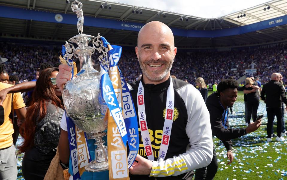 Leicester City manager Enzo Maresca poses with the Championship trophy